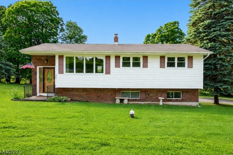 Situated on a PICTURESQUE ACRE of property, this  WELL CARED for 3-bedroom BILEVEL has been CHERISHED by its ORIGINAL OWNER since it was built. The SPACIOUS eat-in kitchen FLOWS SEAMLESSLY into the DINING AREA and BRIGHT LIVING ROOM, creating an OPEN and INVITING layout PERFECT for EVERYDAY LIVING and ENTERTAINING. SLIDING GLASS DOORS off the DINING ROOM  lead to a DECK overooking the EXPANSIVE YARD. The LOWER LEVEL offers a SEMI-FINISHED space featuring a COZY PELLET STOVE,  WALKOUT access to the PATIO, and ENTRY to the GARAGE  providing ENDLESS POSSIBILITIES for ADDITIONAL LIVING or RECREATION space. HARDWOOD FLOORS under the carpeting, adding even more POTENTIAL to MAKE THIS HOME YOUR OWN. A WONDERFUL OPPORTUNITY to ENJOY COMFORT, SPACE, and PRIVACY in a BEAUTIFUL SETTING. *NEW SEPTIC TO BE INSTALLED AT CLOSING, OR SELLER WILL OFFER CREDIT.*