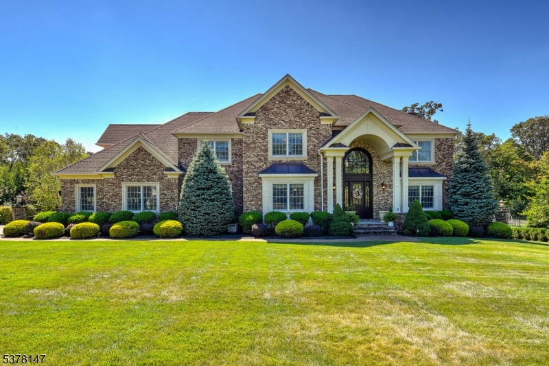 Tucked away on the Watchung Mountains in Warren Township this custom colonial is being offered for the first time by the original owner. Built by esteemed CRC Communities on 1.75 acres it is located minutes from major highways (RT 22, RT 287, RT 78) and highly desirable public (Warren Twp Schools) and private schools (Pingry, Immaculata). Nearly 5,000 sq/ft this home will provide you with everything you need. A stunning 6 bedroom 5.5 bath estate offers the perfect blend of elegance, space, and modern convenience.Welcomed in the grand foyer, nearby are the formal living and dining rooms. Gather and entertain in the gourmet chef's kitchen witch connects to the family room with fireplace. The kitchen with luxury appliances, provides all the cabinet space you will need. An office/bedroom, full bath, laundry room & powder room complete the first floor.Upstairs you have an expansive primary suite with sitting area, walk in closets, and spa like en suite. Along with four generously sized secondary bedrooms, each with ample closet space and access to full baths. A full sized walkout finished basement offers nearly 2500 sqft of extra living space, including, exercise room, wet bar, rec room, full bath, & more.No expense was spared when upgrading and adding amenities. 10 foot ceilings, security system, gas fireplaces, multi zoned heating & cooling, generator, maintenance-free covered deck, in-ground pool, outdoor kitchen, fire pit gathering area, professional landscaping, and more.