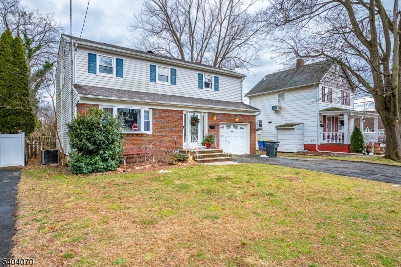 This spacious four-bedroom, two-and-a-half-bath Colonial is bright and sunny, featuring generously sized rooms that radiate warmth and timeless charm. The attractive exterior enhances the home's overall curb appeal, setting the tone from the moment you arrive. Inside, the well-proportioned layout is ideal for both comfortable living and effortless entertaining. The updated kitchen is equipped with stainless steel appliances and thoughtful upgrades designed for contemporary living. Sparkling hardwood floors span the first and second levels, making this home truly move-in ready. Conveniently located close to major highways, the property offers easy access for commuting while remaining near local amenities combining classic elegance with everyday practicality.. Property is being sold AS-IS