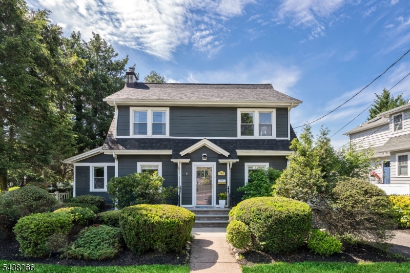 Perfectly positioned in one of Ridgewood's most convenient locations, this 3-bedroom, 2.5-bath Colonial offers the rare combination of neighborhood charm and easy access to schools, parks, downtown shopping, dining, and NYC transportation. Known for its close-knit feel, Spencer Place is the kind of street where neighbors gather and friendships form. Thoughtful updates throughout the home provide peace of mind, including HardiePlank siding, replacement windows, Trex decking, an updated kitchen, and renovated baths. Generous living spaces are designed for everyday life, including a flexible first-floor room with a private entrance ideal as a home office, guest space, playroom, or future first-floor suite. The lower level is currently used as an artist's studio and offers additional recreation space, along with a laundry room and abundant storage. With many of the home's most important improvements already completed and a location that makes daily life remarkably easy, this is a wonderful opportunity to become part of one of Ridgewood's most welcoming neighborhoods.