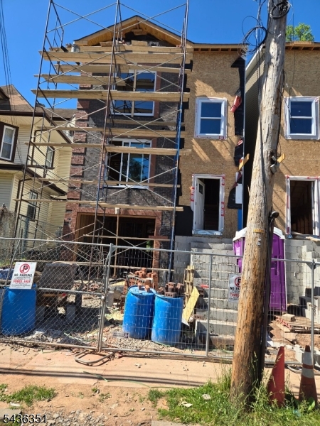 Brand New 2 Family home under construction. Ground level features built-in 2 car garage, large rec room, half bath. Second level features 6 rooms- 3 bedrooms, 2 full baths. Third level features 6 rooms- 3 bedrooms, 2 full baths. Oak hardwood flooring throughout with ceramic tile in kitchen and baths. Stainless steel kitchen appliance. Two zone central air conditioning and forced hot air, 9' tray ceilings throughout. Property is eligible for a 5 year tax abatement and a 10 year home warranty. HURRY will not last.