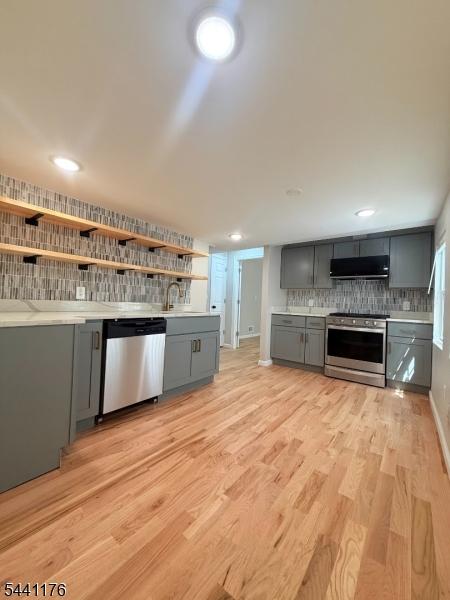 Updated and well-maintained 3-bedroom, 3.5-bath home offering a spacious and functional layout. The first floor features a primary bedroom with a full en-suite bathroom, providing flexibility and convenience. Open-concept living and dining area, hardwood floors throughout, oversized closets, central air conditioning, and forced-air heat. All bedrooms are generously sized and offer excellent closet space. A unique highlight of this property is the detached bonus living area with its own private entrance and full bathroom, offering endless possibilities for recreation, a home office, guest space, or additional living area. Conveniently located with off-street parking and easy access to major highways, public transportation, shopping, and schools.