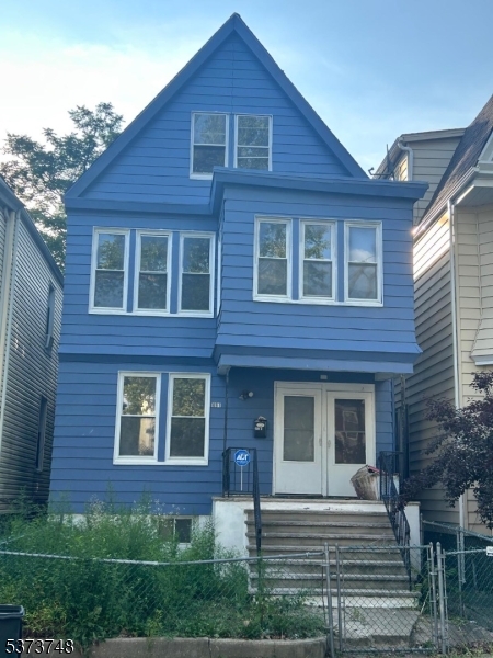Attention savy investors and buyers. Stunning Income-Generating in East Orange Flip Opportunity! Step into this charming 1925-built two-family home, ideally located near transit, parks, and shops. The first-floor unit has the potential to offer 2 bedrooms, a modern eat-in kitchen, luxe hardwood/tile floors, and a spacious living/dining area.The second-floor unit features 3 bedrooms, 1 bath, and attic rooms awaiting your design vision perfect for modern rental demand. Both units have separate utilities and heating, ensuring rental efficiency.Attic and basement each has its own separate entrance which could be renovated into a separate space.Don't miss your chance to own and flip a versatile, cash-flowing property in an in-demand East Orange neighborhood... Short Sale