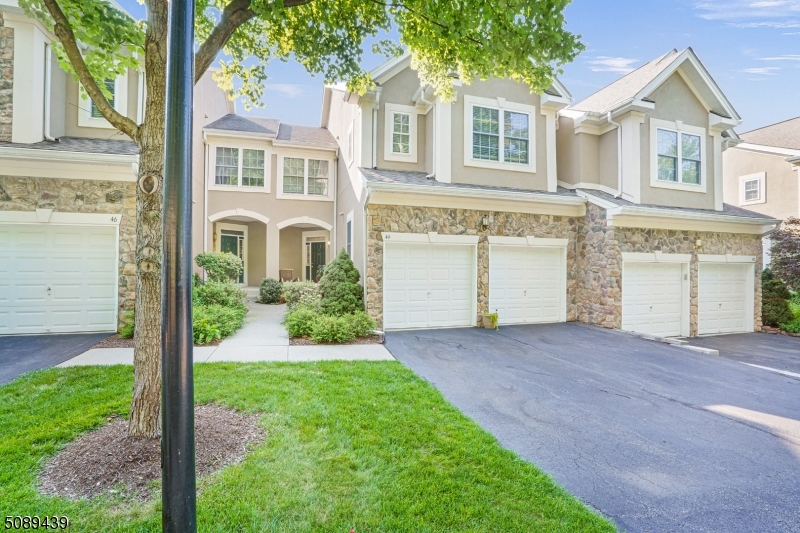 You'll fall in love with this meticulous Princeton townhome. Enter foyer w/gleaming wood floors throughout 1st fl. Exquisite kitchen offers granite counters, stainless appl. & eat at the counter or in the breakfast nook. Living room features a gas fireplace & an abundance of natural light. Formal dining room w/access to deck & modern powder room finish the 1st fl. Master bedroom suite offers walk in closet, tray ceiling, bath w/large shower, soaking tub & double sinks. Off the bedroom is a sitting room that can be easily converted to 4th bedroom. Additionally 2 spacious bedrooms, full bathroom & laundry room complete the 2nd fl. Finished basement lends itself to endless possibilities w/full bathroom & access to patio. Amenities incl: clubhouse, pool, tennis courts. Close to highways. Just unpack & enjoy!