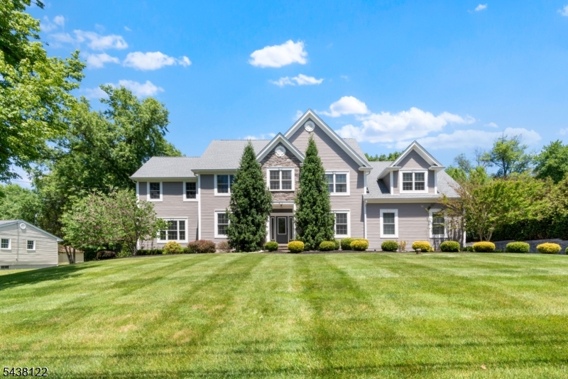 Welcome to this exceptional residence nestled in one of Bridgewater's desirable neighborhoods. Thoughtfully updated, impeccably maintained & just built 9 years ago! This home offers the perfect blend of elegance, comfort, and resort-style luxury living. The gourmet kitchen is the heart of the home with a extra large center island, custom cabinetry, double oven, pull-out microwave, closet pantry, and abundant workspace for everyday living and entertaining. The spacious primary suite offers a large private sitting area, 2 Walk in Closets & full bath! While a second ensuite bedroom provides the perfect setup for guests or an in law suite! Step outside to your own backyard oasis. The fully fenced yard showcasing a custom heated swimming pool with tanning ledge, deck & pool fountains, and an in-floor self-cleaning system. Beautiful paver patios and custom stone walkways lead to a spectacular 900-square-foot covered Trex deck complete with four heaters and a retractable projector screen, creating the ultimate outdoor entertainment space. Additional highlights include a 3-car finished garage with SwissTrax flooring and ProSlat organization system,  professional landscaping, sprinkler system, Tesla 240v charging outlet, central vac, smart switches downstairs & hardwood floors under carpet upstairs to name a few! Welcome to 24 Claire Drive. Welcome to your Private Resort. Welcome Home!