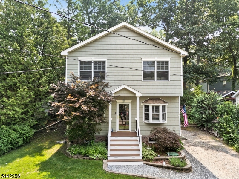 Welcome to this beautifully maintained home tucked away in the sought-after Erskine Lakes section of Ringwood. Pride of ownership truly shines throughout   this home is neat as a pin and ready for you to move right in! Located on a dead end street the first floor features a renovated kitchen with sliders leading to a spacious deck, perfect for entertaining or relaxing outdoors. The welcoming foyer offers the ideal spot for backpacks or a cozy bench to kick off your shoes after a long day. You'll also find a bedroom with a full bath on the main level   perfect for guests or one-floor living. Upstairs, the oversized primary suite boasts a walk-in closet and a stylish en-suite bath. A second bedroom, full hall bath, and a loft area complete the upper level. The loft is currently used as an additional living room but provides flexible space for a home office, play area, or gym, whatever suits your lifestyle. Enjoy optional membership to Erskine Lakes, offering access to boating, swimming, and community events   the perfect way to enjoy lake-life living in a close-knit neighborhood. Don't miss this rare opportunity to own a move-in ready home in one of Ringwood's most desirable lake communities!