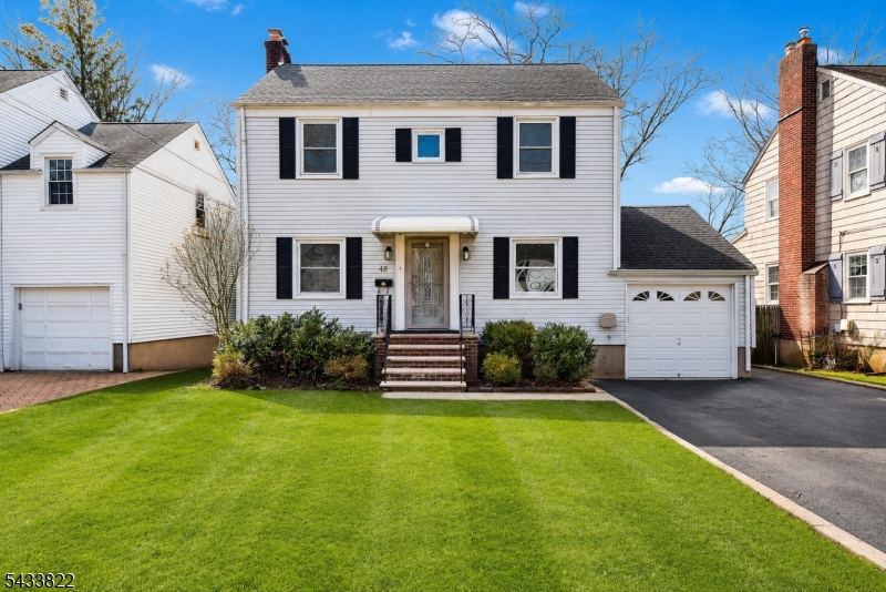 Move-in ready, this is a rare opportunity to own a turnkey home in one of New jersey's sought-after communities and top school district. Nestled on a quiet residential street in the heart of Livingston, this beautifully renovated Colonial blends timeless charm with modern updates. 49 Amherst Place offers bright, sun-filled living spaces, refinished hardwood floors, and a thoughtfully updated interior designed for today's lifestyle. The inviting layout features 3 spacious bedrooms, updated baths, a finished basement perfect for a recreation room, home office, or gym, and a sunroom overlooking the private fenced backyard. The renovated kitchen flows seamlessly into the dining and living areas, creating an ideal setting for both everyday living and entertaining.Additional highlights include central air conditioning, an attached garage, deck, and beautifully maintained outdoor space. Conveniently located near schools, parks, the town pool, library, shopping, and dining, with easy access to major highways and NYC transportation.