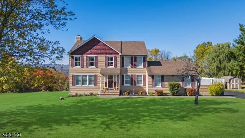Welcome to this superbly crafted 4 Bedroom, 2.5 Bathroom Center-Hall Colonial boasting an Entertainer's Dream backyard with INCREDIBLE YEAR ROUND MOUNTAINOUS VIEWS nestled in highly sought-after Old Orchard neighborhood! Upon entry you are greeted by a soaring 2-Story Foyer accompanied by an Open-Concept Floor Plan featuring a large Living Room with natural-gas Fireplace and slider door access to a private screened-in Deck/Sunroom with breathtaking views. First Floor also offers a beautifully Renovated Kitchen with Brazilian Granite Countertops, Breakfast Bar, custom Backsplash & all matching Samsung Black Stainless Steel appliances, Butlers Pantry, separate Family Room, and a Formal Dining Room. Ascend to the Second Floor where you will find 4 spacious Bedrooms and 2 Full Baths including a Primary Bedroom offering vaulted Ceilings, an En-Suite Bathroom with Dual Vanity Sink & a Walk-In Closet. The Full Unfinished Basement is your canvas waiting for your design and creativity. The Backyard oasis features a custom In-Ground Pool with vinyl fencing and an absolute MASSIVE BACKYARD ideal for relaxation, hosting, and entertaining. Located just minutes away from the renowned 4 Season Resorts Crystal Springs, Minerals, & Mountain Creek offering a Ski Resort, Waterpark, Mountain Bike mountain, 7 premier Golf Courses, one of the most exquisite Wine Cellars on the East Coast, Appalachian Trail hiking, Fishing, Top-rated restaurants, shops, and much more!