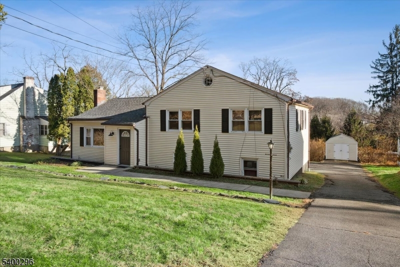Recently Renovated and  ideally located, this 3-bedroom, 2.5 -baths home in Morris Township offers modern comfort just minutes from vibrant Downtown Morristown, its restaurants, shops, entertainment, and the NJ Transit direct train to NYC. Step inside to beautifully refinished hardwood floors and a bright, open living room filled with natural light. The updated eat-in kitchen features stainless steel appliances, including a brand-new 2025 microwave and refrigerator and opens seamlessly to the dining area. Off this space, the oversized sunroom showcases new flooring and beautiful views of the expansive backyard, creating a perfect setting for work, play, or relaxation. Steps up, the spacious primary bedroom enjoys its own updated en-suite bath, while two additional bedrooms share a modern full bath. The ground floor expands your living area with a cozy family/rec-room adjacent to a convenient laundry space and half bath. An attached 1-car garage, extra off-street parking, and a storage shed add convenience. With major highways moments away and all the attractions of Morristown at your doorstep, this home blends style, comfort, and an unbeatable location.