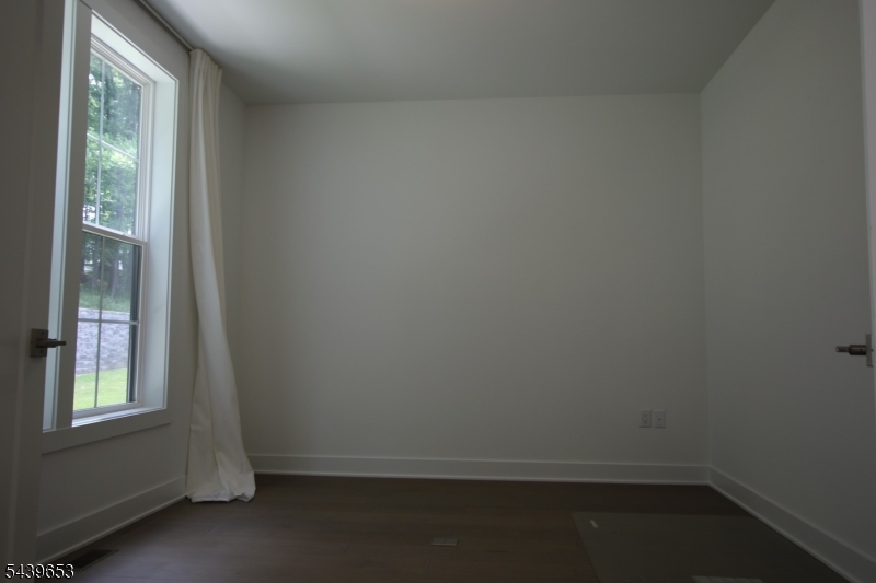 This 2024 new construction beautifully locates in the Cul-De-Sac in a quiet neighborhood. Easy access to Rt 46 and I-80, and NYC direct trains. Close to schools, parks and shopping centers. It features a open main floor with large family room, gourmet kitchen with central island, dining room open to a private deck and backyard. The second floor has the bright master bedroom with sitting area, double walk-in closets, hot tub and stalled shower. Two additional bedrooms shared a hall bathroom. The large laundry room completes the second floor. Basement offers huge storage space. All three floors have high ceilings. The two-car garage has a EV charger installed. The new community offers gym, club and swimming pool. Come to see this elegant end unit in the Cul-De-Sac.