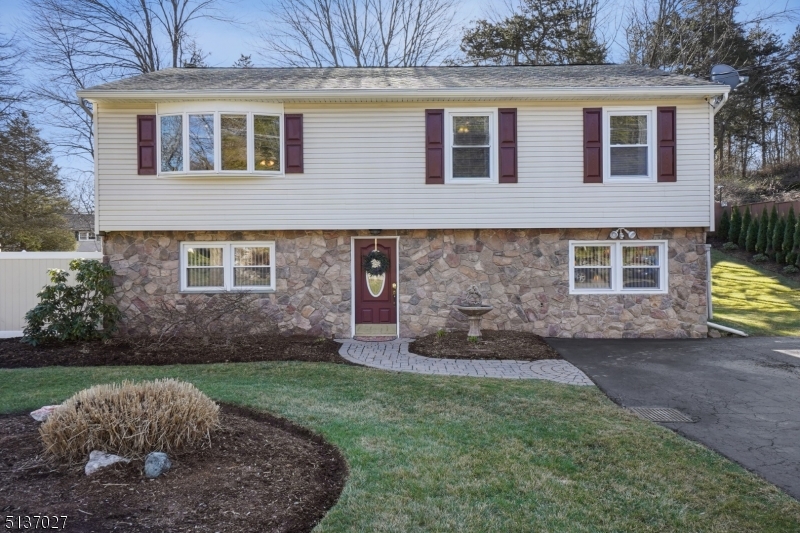 Nestled in Vernon Valley, this meticulously maintained 3 bedroom home has so much to offer.  Upon entry, a spacious family room and den provide options for multigenerational living.  Upstairs, an open floor plan features large living room, dining room, and kitchen spaces that let in tons of light.  The updated kitchen has appliances less than 3 years old.  The large deck and separate patio area with fire pit make for easy entertaining or relaxation.  This home is perfect for those who love the great outdoors: minutes from skiing in the winter, lake privileges in the summer (fishing & boating), within range of 7 golf courses, and 1 block from the Appalachian Trail!  The whole house generator provides peace of mind while the attic and 3 sheds on property provide excellent storage! Come visit today!
