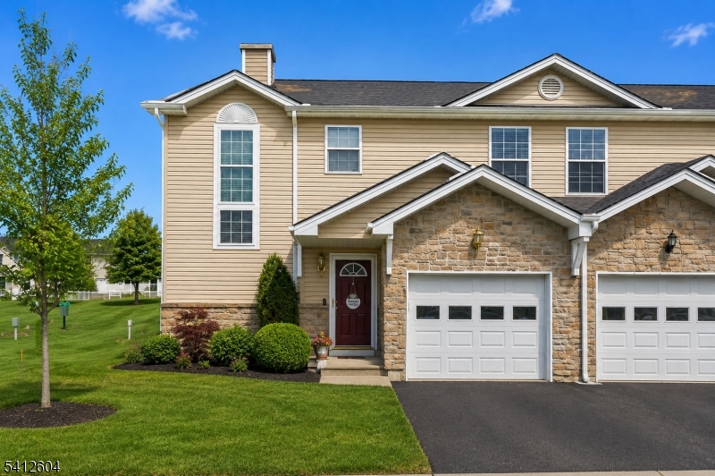 Well-maintained 3-bedroom, 2.5 bath END UNIT townhome located in desirable Ridgefield Commons offering an open floor plan and convenient commuter location. The main level features a bright and spacious layout, gas firplace and was freshly painted along with upstairs hallway within the past year. The finished basement provides additional living or recreation space along with an office.Recent updates include new dishwasher, oven, and microwave (within the past year), Andersen sliding door to the deck, and three tiered front windows replaced. Additional improvements include a water softener and a hot water heater approximately 2 years old. Home is serviced by natural gas, public water, and public sewer. A great opportunity for low-maintenance living in a sought-after community. NEW POOL AND PLAYGROUND AREA  TO BE COMPLETED BY MEMORIAL DAY!  MOVE IN BEFORE SUMMER TO ENJOY IT!
