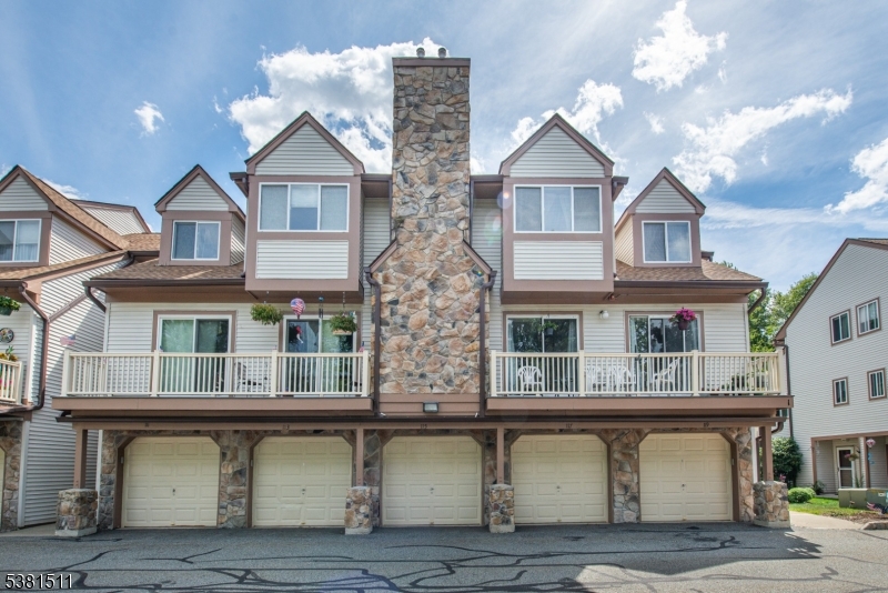 Welcome to this inviting 2-bedroom, 1.5-bathroom townhome located in the desirable community of The Meadows. Perfectly situated within the community, this unit backs up to the woods and is close to shopping, dining, and transportation, this home offers both convenience and comfort. The main level features a bright and open living space with a cozy gas fireplace and sliders leading out to a private deck, ideal for relaxing or entertaining. Upstairs, you'll find two spacious bedrooms, including a primary bedroom with ample closet space, and a full bathroom. This home is equipped with central air, natural gas heating, and public utilities for modern convenience. Additional community amenities include a pool and playground, offering fun and relaxation right at your doorstep. The 1-car garage provides easy parking and extra storage. With its unbeatable location, thoughtful layout, and great amenities, this townhome offers a low-maintenance lifestyle you'll love. Don't miss your chance to call this home!