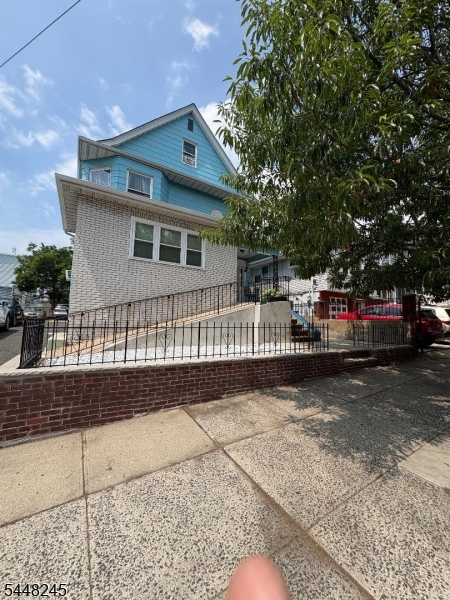 AN INVESTOR OR FIST TIME HOME BUYER DREAM HOUSE. THIS LOVELY 2 FAM. HOME IN GREENVILLE SECTION OF JERSEY CITY WITH A DOUBLE LOT 3 BEDROOMS EACH UNIT SEPARATE UTILITIES. PARKING FOR MORE THAN 6 CARS. IT'S A MUST SEE. VERY CLOSE TO DANFORTH AVE LIGHT RAIL STATION. AND MORE. SEMIFINISHED BASEMENT WITH LOTS OF POTENTIAL.