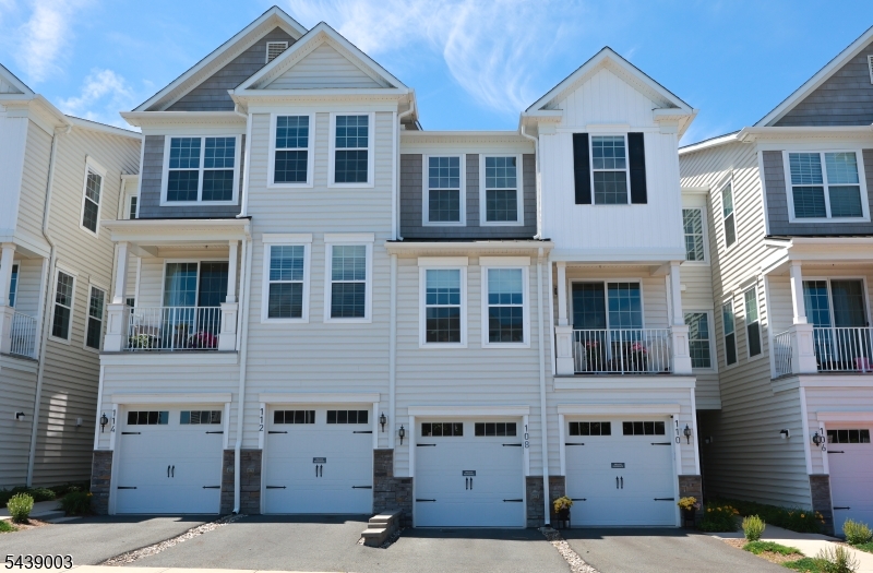Welcome to this beautifully updated home in one of Cedar Grove's most desirable communities. Thoughtfully upgraded throughout, this home showcases gorgeous flooring, custom finishes, and an exceptional eat-in kitchen featuring a granite center island, stainless steel appliances, and custom lighting and hardware. A welcoming foyer leads to a sun-filled open-concept living space highlighted by a gas fireplace, spacious dining area, and a beautifully appointed first-floor full bath. Doors open to an extended private patio and open side yard with no homes behind, offering a rare sense of privacy and outdoor enjoyment. Ideally situated directly across from Cedar Grove Park, the home enjoys unobstructed four-season park views and a rare sense of openness, bringing nature and scenic beauty right to your doorstep - from spring blossoms and summer greenery to brilliant fall foliage and tranquil winter snowfalls. Residents enjoy access to exceptional community amenities, including a clubhouse with a full kitchen and party space, outdoor pool, barbecue areas, and beautifully maintained common grounds. Ideally located near Hilltop Reservation's scenic hiking trails and just a short walk to Cedar Grove Park, playgrounds, and recreational facilities. Conveniently close to shopping, dining, and major commuter routes, this home offers the perfect combination of lifestyle, location, and community.