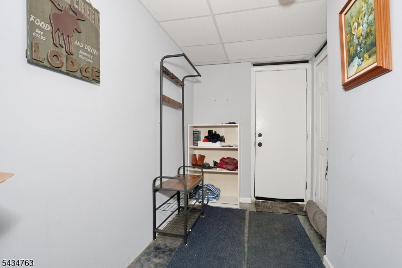 Welcome to Brookside Heights! This 3 bedroom pet friendly townhouse complex is located close to parks, shopping & transportation. First floor entry hall, large eat-in-kitchen w/ss appliances, formal dining room, large living room w/wood burning fireplace & sliding doors to deck, 1/2 bath. The 2nd floor boasts a large primary bedroom w/full bath & sliders to deck, bedroom #2 w/deck, bedroom #3 and the main full bathroom in hallway. The lower level consists of an entry hall from the parking lot, entrance to 1 car attached garage, utilities, laundry and a den/playroom. Other features include, central air, attic storage, 1 included parking spot (#3i), plenty of visitor parking, pool & clubhouse. Water/sewer charge is $330 a quarter. A must see unit!