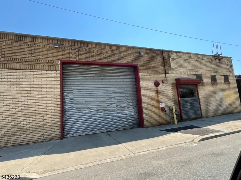 Great opportunity to acquire versatile industrial property currently operating as a school bus company. Situated on approximately 0.76 acres (33,106 sq. ft.), this secured and gated site features Approx.10,000Sqft building with office space and possible expansion opportunity, substantial fully paved yard space, and excellent accessibility for fleet operations, contractors, transportation companies, equipment storage, or other industrial users.The property's expansive lot provides ample room for vehicle parking, outdoor storage, and operational flexibility. Conveniently located with easy access to major highways and transportation routes, this is an ideal owner-user or investment opportunity in one of Paterson's active industrial corridors.