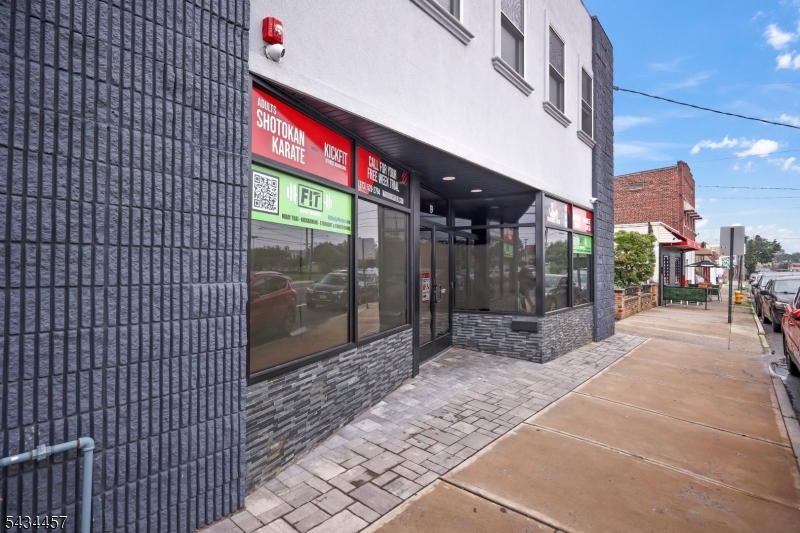 Opportunity meets momentum at 19 Franklin Street; a fully renovated mixed-use asset in the heart of thriving Bloomfield. Reimagined in 2023 with modern finishes and income optimization in mind, this turnkey property delivers immediate cash flow with 6 income-producing rental spaces under one roof. The 2nd floor features three spacious 2-bedrooms, 1-bath residential apartments, thoughtfully updated with stainless steel appliances, sleek contemporary cabinetry, in-unit laundry, and hardwood flooring. On the ground level, a fully leased retail storefront benefits from constant exposure and steady traffic, while the separately rented garage and basement create additional revenue streams that maximize the property's earning potential. Beyond the numbers, this is the kind of asset investors wait for: low maintenance, fully updated, and strategically positioned for long-term appreciation. Positioned directly across from a shopping center, bank, restaurants, and public transportation, 19 Franklin Street sits in one of Bloomfield's most commuter-friendly and high-visibility locations, a major advantage for both residential and commercial tenants alike. With multiple streams of consistent income, strong rental demand, and a prime location in an expanding market, this is more than a property; it's an opportunity engineered for lasting returns. Add this exceptional investment property to your portfolio today.