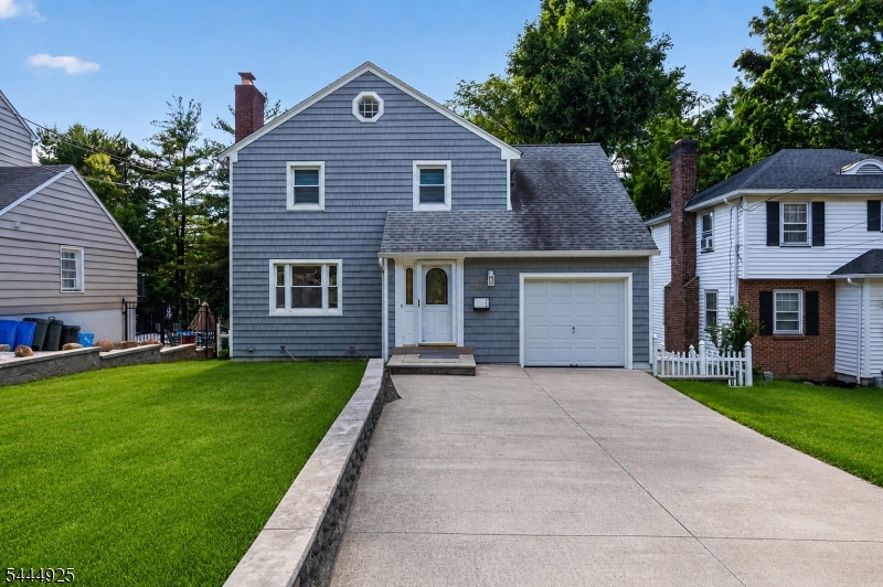 Welcome to this beautifully renovated Storybook Colonial in highly sought-after Livingston. Set on a level, fenced-in lot, this charming 3-bedroom, 1.5-bath home offers the ideal blend of classic character, thoughtful updates, and move-in-ready comfort.Step into a warm entry foyer that opens to a sun-filled living room featuring beautifully restored wood flooring, a classic wood-burning fireplace, and a large picture window overlooking the expansive backyard. The open living and dining area creates an inviting setting for both everyday living and entertaining. The updated kitchen is designed for function and style, offering stainless steel appliances, generous cabinetry, and convenient access to the patio and backyard, perfect for outdoor dining, play, gardening, or relaxing.The 2nd level features 3 comfortable bedrooms and an updated Full Bath. The partially finished basement adds valuable flexible space, ideal for a rec. room, gym, playroom, or media area, complete with a powder room and laundry area.Recent updates include fresh interior paint, restored wood flooring, new interior doors, a new water softener, and a water purification system. East-facing for beautiful morning light; this home is conveniently located near Livingston Town Center, Mt. Pleasant School & Playground, parks, shopping, restaurants, houses of worship, and major highways.Move right in and enjoy comfort, charm, and everyday convenience in Livingston!Move right in and enjoy life in Livingston!