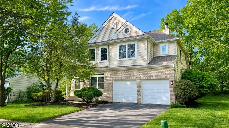 Completely move-in ready 4-bedroom, 2.5-bath colonial on a quiet cul-de-sac in Woods Edge, an established Montgomery Township neighborhood with a Princeton mailing address. 2,269 sqft above grade plus a partially finished basement, 2-car garage, and private morning-sun deck off the eat-in breakfast area. Major updates: 2018 roof, new high-efficiency heat pump (heating and cooling), almost all windows recently replaced, and new window shades throughout. Whole-house fresh paint, new microwave, and new light fixtures. Brazilian cherry (Jatoba) hardwood floors on the first and second floors. Gourmet kitchen with stainless steel appliances and granite countertops. Vaulted family room with fireplace, separate high-ceiling living room, and a main-floor office. Primary suite with walk-in closet and ensuite bath. Second-floor laundry. Woods Edge has its own community park with tennis, pickleball, basketball, and a playground. The 247-acre Skillman Park is a mile away, with paved trails and a dog park. Located in the award-winning Montgomery Township School District. Minutes from Princeton Day School, Stuart Country Day, and The Hun School. Convenient to Palmer Square and Princeton University. The soon-to-open Montgomery Promenade brings Whole Foods, Panera, and Turning Point minutes away. Princeton Junction is 17 minutes away, with train service to Manhattan in about 75 minutes and Philadelphia in 1 hour. Easy access to Routes 206 and 287, Penn Medicine, and Newark Liberty Airport.