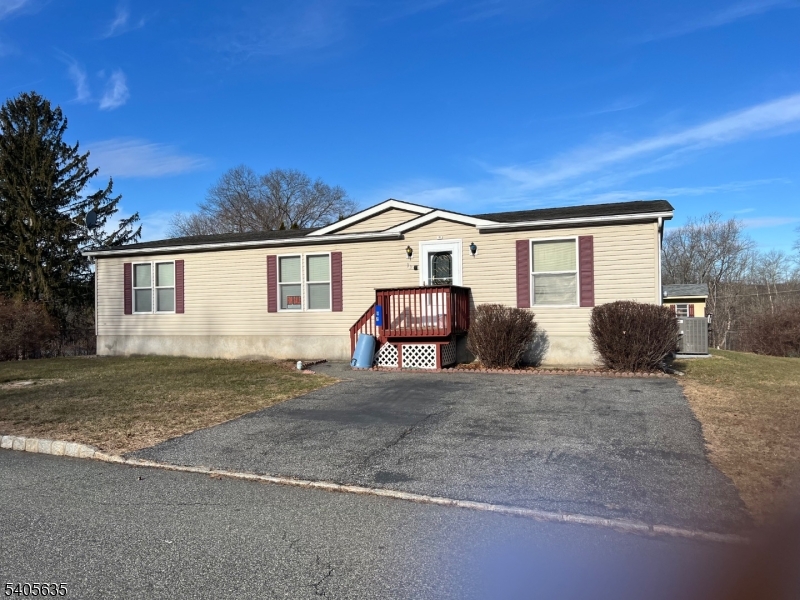 Well maintained 3 Bedroom, 2 Fill Bath Ranch home in Highlander Hills Estates. This is a 55+ lease land community. This home sits on a larger lot and offers a heated sunroom, large back deck and larger storage shed. Newer Rood (2012), Newer Furnace + Central air (2023) , Newer Hot Water Heater (2024). Seller has a maintenance program that can be transferred to new owner. Nice spacious living room with a open floor plan. The large eat-in kitchen offers propane gas stove, dishwasher, refrigerator, pantry and lots of cabinet space. A generous size laundry room is off the kitchen. The primary bedroom has a walk-in closet, full bath with tub/shower and double sinks. Don't miss this one.  Shows pride of ownership! Worth taking a look. Being sold AS-IS. APPLICATION TO COMMUINTY MUST BE APPROVED BEFORE CONTRACT CAN BE SIGNED.