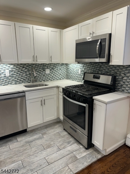 Welcome home to this fantastic completely renovated studio condo nestled in the heart of South Orange Village, where convenience meets character in the most delightful way possible. This inviting residence offers the perfect blend of cozy living and urban accessibility, ideal for first-time buyers, savvy investors, or anyone seeking a low-maintenance lifestyle without sacrificing location. Step inside to discover a thoughtfully designed space that maximizes every square foot while maintaining an open, airy atmosphere that feels far more spacious than you might expect. The location truly amazing here. Picture yourself grabbing your morning espresso at the nearby artisan coffee shop, then taking a leisurely stroll through Founders Park before heading to catch a show at the South Orange Performing Arts Center. The train station sits just moments away, making your commute to Manhattan or Newark a breeze. Weekend adventures might include exploring Seton Hall University's beautiful campus or picking up fresh groceries at Whole Foods Market. This vibrant community offers the rare combination of small-town charm and big-city accessibility that discerning buyers crave. Meadowland Park provides additional green space for outdoor enthusiasts, while the walkable downtown district puts dining, shopping, and entertainment right at your doorstep. Don't let this opportunity slip away schedule your private showing today and discover why so many have fallen in love with South Orange living.