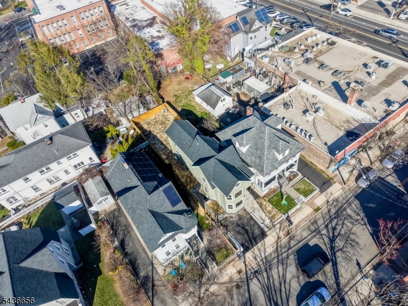 Welcome to refined living in the heart of Leonia. This fully renovated 5-bedroom home offers over 3,300 sq. ft. of beautifully updated living space, combining modern design, flexibility, and exceptional commuter convenience.The open-concept layout seamlessly connects the LR, DR, and kitchen, creating an ideal setting for everyday living and entertaining. Sun-filled interiors feature new hardwood floors throughout the 1st and 2nd levels, while major upgrades include a new roof, new siding, updated electrical system, dual-zone HVAC, and a professionally finished blacktop driveway.A sought-after 1st-floor primary suite with a private full bath provides flexibility for living, guests, or a home office. Upstairs offers 4 spacious BRs, a full bath, and the convenience of 2nd-floor laundry.The finished lower level expands the home's versatility with flexible space perfect for a rec room, fitness area, media room, guest retreat, or office. Additional highlights include a dedicated office, 2nd washer/dryer, and a wet bar with an L-shaped peninsula.Ideally located near schools, parks, shopping, dining, major highways, NJ Transit, and just minutes from the GW Bridge and NYC transportation. Move-in ready and thoughtfully updated, this is a rare opportunity to own a turnkey home offering space, style, and commuter convenience in one of Bergen County's most desirable communities.