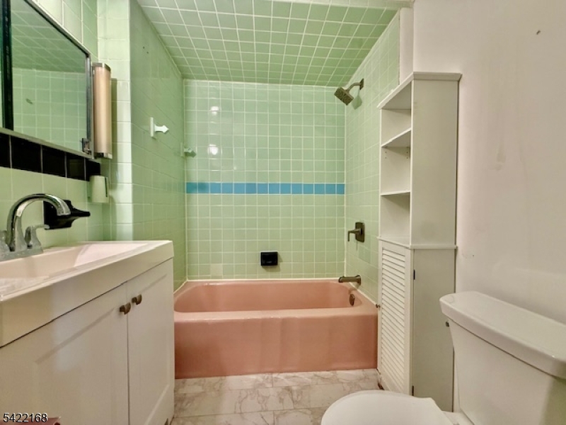 Welcome to this well maintained first floor 2-bedroom, 1-bathroom unit, perfect for comfortable living. The unit offers a kitchen, a dining room, a large family room, and extra storage rooms. Driveway parking will be allocated to one of the units. Street parking is never an issue. Enjoy a bit of outdoor relaxation in the shared backyard space, perfect for lounging or small gatherings. Conveniently located near public transit, with easy access to both trains and buses, making NYC commutes simple and fast. This is a fantastic opportunity for anyone looking for both comfort and convenience! All applicants must have a credit score of 670 or higher, must have a 3:1 income to rent ratio. NTN report required.