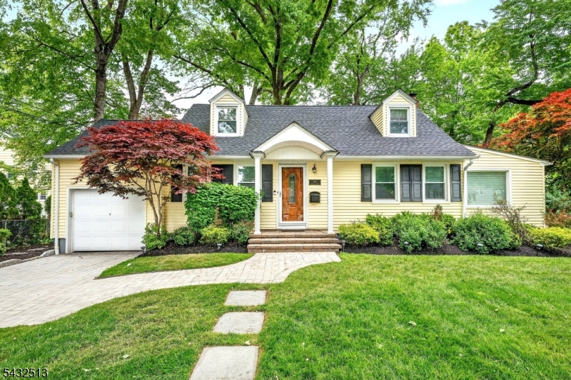 Charming updated expanded  custom Cape Cod located   in desirable Inman Height Area  on wide  landscaped setting with sprinkler system, paver driveway, walkway & rear patio, plus deck off FR. Many upgrades-,Brazilian wood floors, new windows, new tankless hot water heater, new stove & hood, newer roof, (see list in disclosures). Included: Refrigerator, Washer, Dryer. convenient area near to Downtown NYC rail services dining, and shopping and recreational areas.