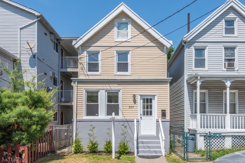 557 Christopher Street offers an opportunity to own an updated single-family home in the Valley section of Orange, just minutes from the NJ Transit Highland Avenue Station with convenient access to NYC transportation, local bus lines, and nearby shopping, dining, and entertainment. A smart alternative to renting, this move-in ready Colonial combines classic character with thoughtful updates throughout. Inside, you will find LVP flooring, an updated kitchen with shaker-style cabinetry, quartz countertops, stainless steel appliances, and a refreshed modern bath. The fenced backyard provides additional outdoor space for relaxing, gardening, or entertaining. Enjoy close proximity to the Valley Arts District, South Orange downtown, West Orange shopping and dining, local parks, Harper's Cafe, and the legendary Star Tavern. This home qualifies for CRA financing programs featuring low down payment options and no PMI for qualified buyers, creating an excellent opportunity for first-time buyers seeking access to homeownership in Essex County. Property located in FEMA AO flood zone. On-street parking only.