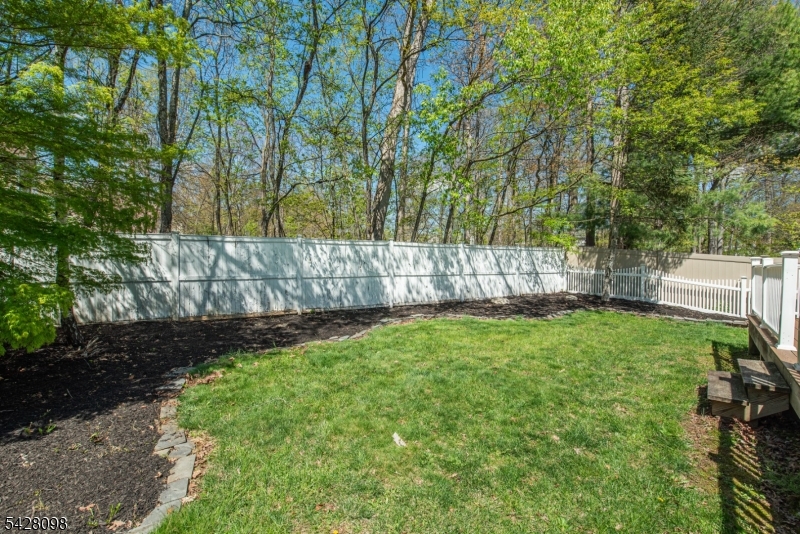 Welcome to this well-maintained 3-bedroom, 2.5-bath Colonial located in the highly desirable Pond Hollow Village. This home offers a bright and open floor plan filled with natural light, complemented by premium laminate floors throughout, recessed lighting and newer roof (2024). The eat-in kitchen features stainless steel appliances and flows seamlessly into the main living areas, including a separate formal dining room ideal for both everyday living and entertaining. The living room is highlighted by a wood-burning fireplace and a door leading directly to the backyard. Upstairs, the spacious primary suite includes a walk-in closet and a full bath with double vanity, stall shower, and tub. Two additional bedrooms and a full bath complete the second level. Additional features include a 2-car garage, public utilities, natural gas, central air, and a fenced-in backyard offering privacy and outdoor enjoyment. Conveniently located within a sought-after community, this home is ready for its next owner to move right in and enjoy.