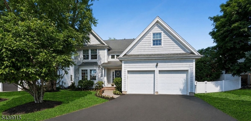 Welcome to this Brookdale beauty! Perfectly situated on a quiet cul-de-sac in Bloomfield's highly sought after Brookdale section, this turn key 2004 built Colonial combines modern open-concept living with impeccable maintenance and thoughtful updates. Exceptional curb appeal and manicured landscaping set the stage for sun-filled interiors featuring hardwood floors, formal living and dining rooms, and a spectacular great room where a chef-ready kitchen flows seamlessly into the main living space. Glass sliders open to a private patio overlooking a large, fully fenced, beautifully landscaped backyard--your own outdoor oasis. A powder room completes the first level. Upstairs, you'll find four generously sized bedrooms and two full baths, including a luxurious primary suite with a beautifully renovated ensuite bath. The expansive unfinished basement with extra-high ceilings offers endless possibilities for a home gym, media room, recreation space, or future finished living area. With NJ Transit bus service to NYC conveniently located across the street, popular local restaurants and shops nearby, and Brookdale Park just moments away, this home offers an exceptional combination of space, convenience, and lifestyle. If you prefer the train to NYC, take the nearby shuttle to the Bloomfield station. Second floor laundry, brand new carpets in bedrooms and EV charger in the garage! Images of the basement are virtually enhanced.