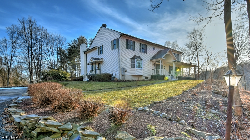 Welcome to this meticulous, sun-filled country estate perfectly situated up from the road on 22 idyllic acres complimented by privacy & nature. Be drawn into the superb cooks kitchen featuring Viking appliances, custom cabinets & granite ctrs all overlooking the open concept great room w/ pellet stove, breakfast room, wet bar & wide planked HW flooring  perfectly embraced by exquisite views . Upstairs offers a generous sized master suite, full bath & sitting area, cedar lined walk-in closet & 2 additional oversized bedrooms. Exterior features include: pool, outdoor kitchen, wrap around covered porches, large multi-sport court, 2 stall shed row w/ elec, water, tack, feed, hay rm & riding ring. Multiple pastures w/ run-in sheds, elec & water. Ride, hunt, fish, hike, swim, play tennis & never leave home!