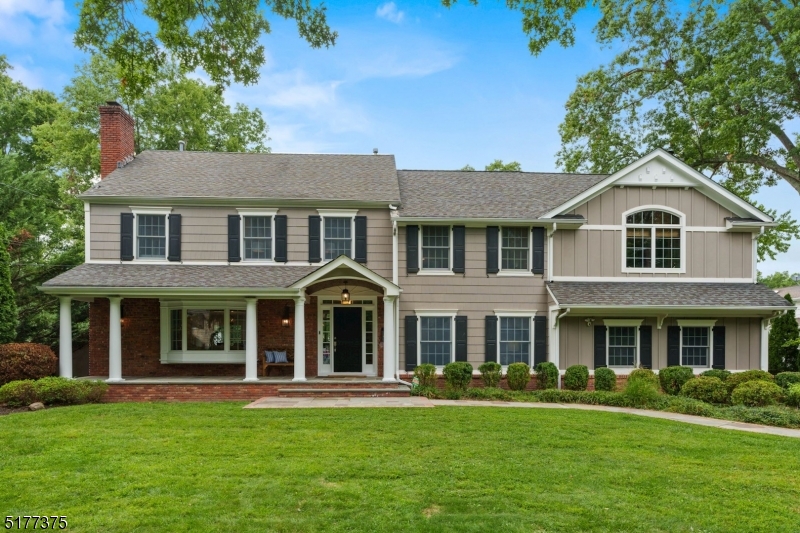 Spectacular colonial home with ideal open floor plan! Custom designed and expanded with attention to detail. This 4-5 bedroom home offers an open floor plan with stunning gourmet kitchen with professional stainless steel appliances, two dishwashers, over sized center island, walk in pantry and sky lights all open to large family room and dining room, architectural windows showered this area with natural light all overlooking the expansive level yard, A large formal living room, mud room accessing 2 car garage, laundry and powder room complete the first level. The enormous two room primary suite will take your breath away, vaulted ceilings, architectural windows, custom built ins, fireplace, spa like bath with soaking tub, radiant heated floors, walk in closet, laundry connection and a sitting balcony looking out over property. Three additional spacious bedrooms and full update bath complete the second level.  The finished lower level features a recreation room, guest area with full bath and cellar. This home is perfectly located on .48 of an acre of beautifully landscaped and fenced in property.  Low taxes! Close to top rated millburn schools, towns and NYC trains.