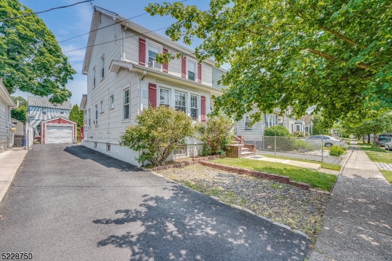 Come see this CHARMING, move-in-ready 3 bed 1 bath colonial located in the desirable Demarest section in the heart of Bloomfield. This home is also only blocks away from the bus stop to NY and Jitney to the train and is conveniently located with easy access to major highways, shops, restaurants and the 121-acre Brookdale Park. As you enter the home, you're invited with gleaming hardwood floors and gorgeous wooden beams in the living room that gives you that old charm. The den, living and dining room are spacious and meticulously beautiful. Cook in your renovated kitchen and host parties off your back porch, deck/patio and backyard. Outside you will find an extra-long driveway that will accommodate up to four cars, a perfect sized yard with a large one car garage.As you go to the second floor, you will pass through the modern bathroom, three bedrooms, and an oversized walkup attic. The basement has the potential to make it whatever you want!  Come see it before it's gone!