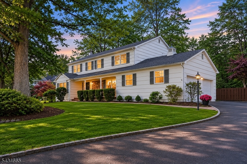 Experience this stunning Center Hall Colonial perfectly situated in highly-sought after Wickham Woods neighborhood featuring an ENTERTAINERS DREAM BACKYARD NEARBY THE HEART OF DOWNTOWN CHATHAM & LESS THAN 1 HOUR TO NYC! Upon entry you are greeted by a Soaring 2-Story Foyer, gorgeous Hardwood Floors all-throughout, spacious Living Room, Family Room with Brick-Faced Wood-Burning Fireplace and slider door access to your very own private Deck, Formal Dining Room, Eat-In Kitchen highlighted by custom Cabinetry, Center Island, Granite Countertops, Thermador Stainless Steel Appliances, Laundry Room / Mudroom & direct access to a 2-Car Garage. Ascend upstairs where you will find a Large Primary Suite with En-Suite Bathroom, a Sitting Room, 2 California Closets, and 3 additional spacious Bedrooms & hallway Full Bathroom completing the space. The Full Finished Basement allows endless possibilities offering a BONUS Office / Recreation Room, Wine Rack / Wine Cellar & a Sauna. The Fully Fenced-In BACKYARD OASIS HAS COMPLETE PRIVACY featuring a Concrete In-Ground Swimming Pool surrounded by a Paver-Patio, mature lush landscaping, a composite Deck, HUGE flat yard space & Storage Shed. Enjoy this neighborhood that is ideal for socializing, strolling, outdoor play, and all Chatham has to offer with Top Rated Schools, NYC Trains, wonderful restaurants, excellent shopping and close to major highways and international airport. Come make this home yours before someone else does!