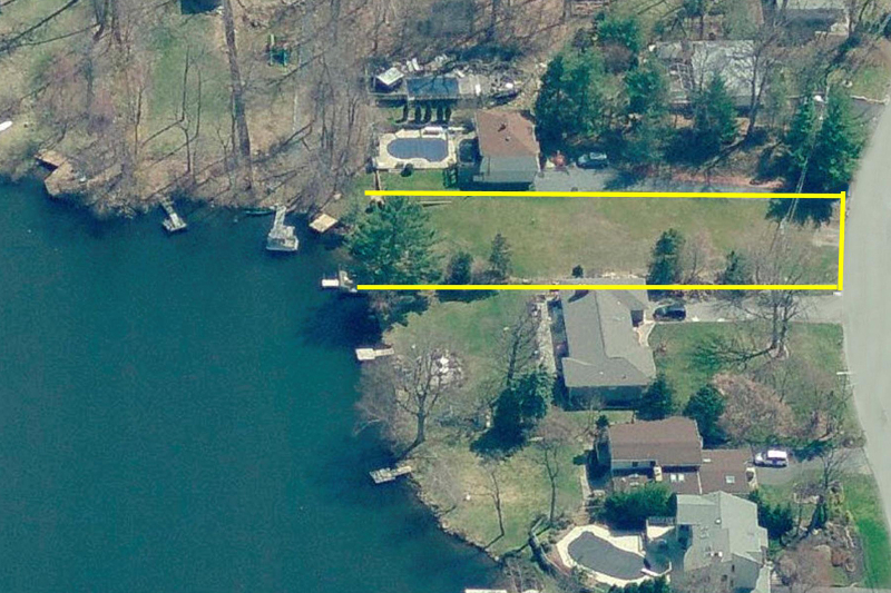 Build your Dream Home and vacation in your own backyard! TRUE LAKEFRONT on White Meadow Lake! Cleared building lot is ready for your NEW Custom House.  Owner states a 3200 sq. ft. house can be built on this LEVEL lot where previous home had existed. Great Location - ENJOY the White Meadow Lake Lifestyle with year-round Activities, Clubhouse, Day Camp, Pre-School, Gorgeous Lake with Boating, Fishing, Swimming, 3 Beaches, Pools, Playgrounds, Tennis & Basketball Courts, Athletic Fields & MORE! Boat Dock already on property. NATURAL GAS in Street. OPPORTUNITY KNOCKS! Grab it before it's gone!