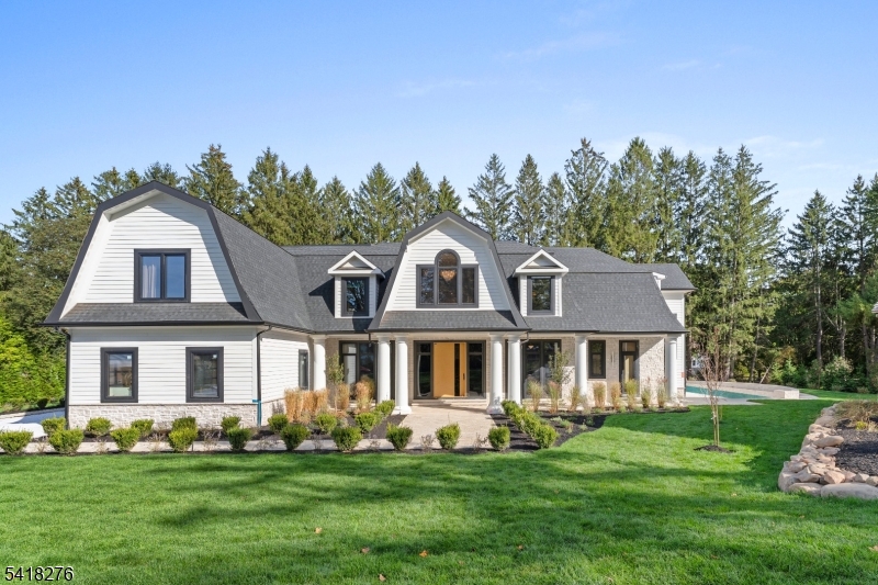 48 Pleasant Avenue, Upper Saddle River, NJ   Where Timeless Design Meets Modern InnovationSet on one of Upper Saddle River's most distinguished streets, 48 Pleasant Avenue is a newly constructed estate that blends architectural sophistication with modern functionality. Built on a new foundation and finished with LP wood siding, this 12,900 square feet, 6-bedroom, 6 full en-suite and 3 half-bath residence showcases refined design across every level.Inside, soaring ceilings and radiant-heated floors define a space that is both luxurious and livable. The main floor features a gourmet kitchen, formal dining area, and a first-floor ensuite bedroom for flexibility. The lower level is designed for recreation and creativity, with an art studio, fitness area, movie room, and family/game room under 10-foot ceilings.A private elevator connects all levels, including a second-floor office and an unfinished attic ready for customization. Every bedroom offers comfort and privacy, while the home is pre-wired for Cat 6 connectivity, security, and smart-home integration.Outdoors, enjoy a resort-style heated saltwater pool, sprinkler system, and expansive patio. A 6-car garage and 15+ car driveway provide ample parking. With multi-zone radiant heat, central air, municipal water, and septic with unlimited capacity for the house and barn, this home delivers performance, luxury, and longevity in Bergen County's premier enclave.