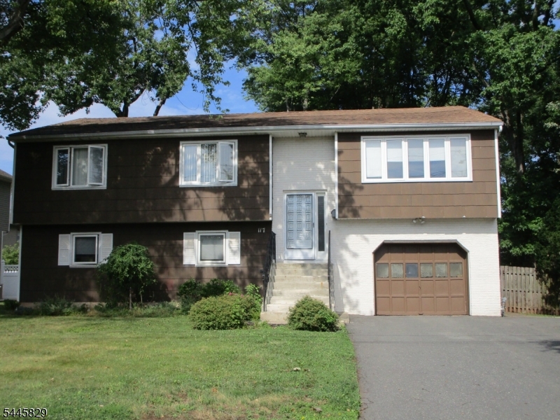 Tremendous opportunity to own this LARGE home at the top of a dead end street with great potential to add value. The HUGE eat-in kitchen flows seamlessly to the dining and living rooms, an optimal floorplan for entertaining. Spacious rooms throughout. Centrally located about a half mile from the Garden State Parkway, 1 mile from Clark Commons, and only a couple blocks to Valley Road School. Ample parking in the attached garage and double-wide driveway. AS-IS sale.