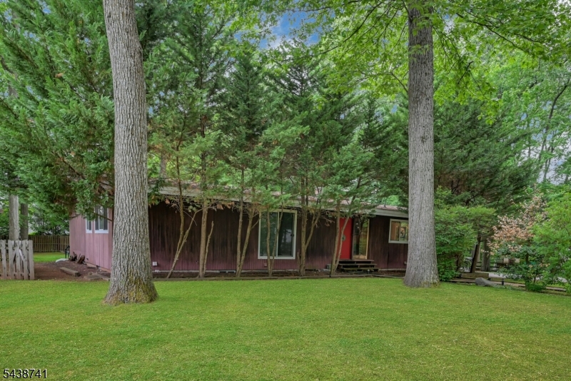 First time on the market! Rare opportunity for investors, builders, or buyers looking to renovate and create value in sought-after Washington Township. Set on an impressive and private .96-acre lot, this ranch-style home offers incredible potential for updating, expansion, or customization to fit your vision.The home features 3 bedrooms, 3 full bathrooms, a spacious living room with a striking stone fireplace, and an oversized eat-in kitchen with excellent space and layout potential. A partially finished basement adds even more opportunity for additional living space, recreation, work-from-home setup, or guest accommodations.The expansive level backyard provides endless possibilities for outdoor entertaining, future improvements, or creating your own private retreat. Whether you are an investor seeking your next project or a buyer ready to transform a well-located home into something special, this property offers strong upside in a desirable location close to shopping, dining, schools, and major transportation routes.Property is being sold strictly as-is; no credits or repairs will be provided
