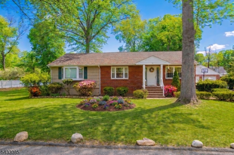 Welcome to 74 Armstrong Avenue, a beautiful brick ranch home located in Wayne's highly desirable Black Oak neighborhood! Sitting on a huge, flat half-acre lot, this home has been completely and beautifully renovated over the past two years. Everything is fresh, modern, and 100% move-in ready.The main floor serves as the heart of the home, featuring a bright, airy layout with three comfortable bedrooms and two full bathrooms. This includes a wonderful Master Bedroom Suite featuring sliding glass doors that lead directly onto a large wood deck overlooking your deep, park-like backyard. The private, renovated master bathroom serves as your own personal oasis, complete with a luxurious built-in Jacuzzi tub. There is also a cozy, heated sunroom on this level to enjoy all year round.To add even more value, the property features a beautifully finished, walk-out basement. This nicely renovated lower level provides incredible bonus living space and features the home's third full bathroom, making it a perfect retreat or recreation area.Living here offers an amazing lifestyle! You are just moments away from the wonderful Pines Lake community, and the home is zoned for Wayne's top-rated schools: Pines Lake Elementary, Schuyler-Colfax Middle, and Wayne Hills High School. Complete with a large, detached 2-car garage and incredible curb appeal, this turn-key property is a rare find!