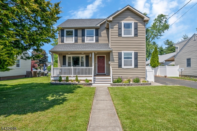 Welcome Home! This beautifully rebuilt and expanded 3-bedroom, 3.5-bath Colonial offers the perfect blend of modern style, comfort, and functionality. This move-in ready home boasts an open-concept layout with rich hardwood floors, recessed lighting, crown molding, and abundant natural light throughout. The stunning kitchen is equipped with shaker cabinetry, granite countertops, stainless steel appliances, farmhouse sink, and plenty of prep and storage space, flowing seamlessly into the dining area and spacious living room with custom wood accent wall and electric fireplace. Upstairs, the oversized primary suite offers a walkin closet and spa-like ensuite bath with double vanity and beautifully tiled shower. Two additional bedrooms and a full bath complete the second floor. Outside, enjoy the welcoming front porch, large maintenance-free deck, fully fenced backyard, and expansive lawn perfect for entertaining, play, or relaxing. Full basement offers excellent storage, laundry area, utility space, and additional potential. Conveniently located near parks, schools, shopping, and transportation, this home combines classic curb appeal with today's most desirable updates.