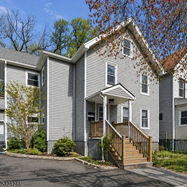 Wonderful opportunity to own a two-family home located in a designated redevelopment zone in the vibrant community of South Orange. Conveniently situated within walking distance to the South Orange train station and Village, offering easy access to NYC, shops, dining, and local amenities.This income-generating property features separate utilities for each unit. Both units offer 2 bedrooms, a living room, eat-in kitchen, and full bath The basement includes a shared laundry area along with ample storage space. Enjoy everything South Orange has to offer, including beautiful parks, recreation, a strong school system, and a thriving arts and cultural scene.