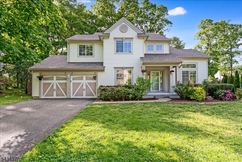 Welcome to one of the most desirable lots in Country Oaks! This beautifully maintained home offers a finished basement, an oversized level yard, and a spacious deck perfect for enjoying the outdoors.The updated kitchen features high-end cabinetry, Italian wood-look tile flooring, quartz countertops, soft-close drawers, custom lighting, Samsung stainless steel appliances, and a separate dining area with sliding doors that open to the deck overlooking the expansive backyard. The main level includes an elegant formal dining room with hardwood floors and chair rail molding, a light-filled living room with vaulted ceilings, and a comfortable family room with a gas fireplace and hardwood-like tile flooring. The home is equipped with central vacuum. Upstairs, the spacious primary suite showcases a vaulted ceiling and a private ensuite bath. Three additional bedrooms provide flexible space for a variety of needs. The finished basement includes built-ins, offering additional living, work, or recreation space. Country Oaks offers a well-maintained community setting with sidewalks, walking paths, open green space, and a playground. The property is served by a private community water and sewer system. This home has a new HVAC system (2024) and new hot water tank (2026).Sidewalk-lined streets and a convenient location provide easy access to shopping, dining, and everyday amenities.This move-in ready home presents a wonderful opportunity to enjoy comfort, space, and a great setting.