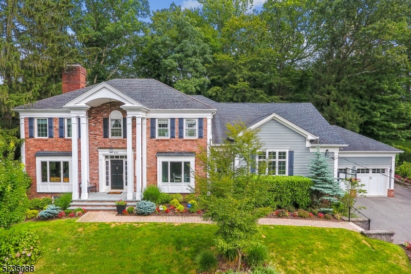 Completely renovated and expanded five bedroom colonial. Tasteful, spacious, beautifully modern.