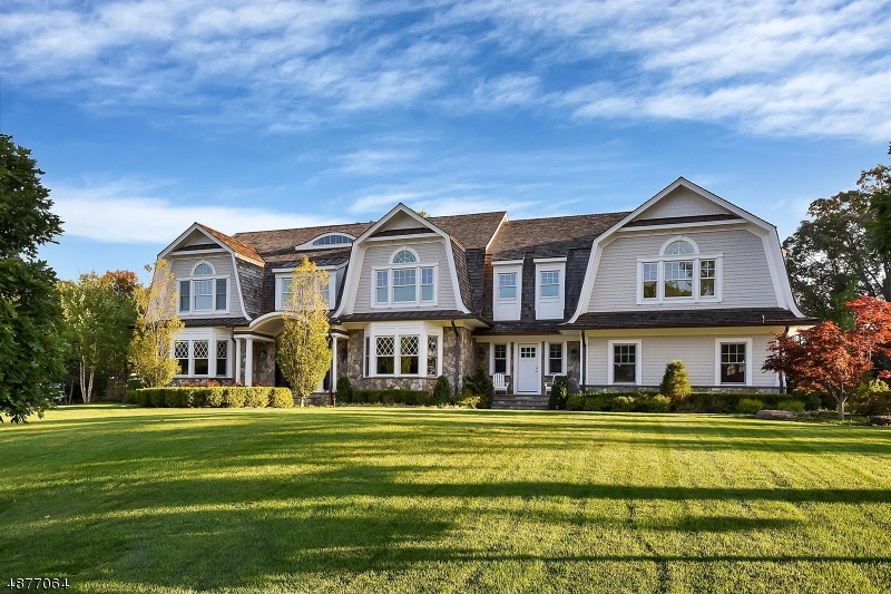 Stunning 4-year young cedar & stone Hampton style home! Light & bright! High ceilings. Spacious rooms. Open layout. Exceptional quality. Wonderful transitional flair with hip vibe! 2-story EF. Lib/custom built-ins/coffered ceiling. Banquet-sized FDR. Butler?s Pantry. Massive Kit/top appls/?leathered? granite counters/huge center island/reclaimed wood accents/beautiful cabinetry. Great Rm/fpl/coffered ceiling/built-ins & French doors to patio. Playrm/Den, outfitted Mud Rm & 2 Powder Rms . 2nd Flr features a luxe MBR Suite/fpl/tray ceiling/huge outfitted WICs & spa-like MBath/jetted tub/steam shower/radiant heated floor. 4 addl BRs (each with en suite Baths) & Lndry Rm.  Fully finished LL with huge Rec/Media Rm/wet bar, Playrm, Game Rm, Gym, full Bath & Storage Rm. House generator.