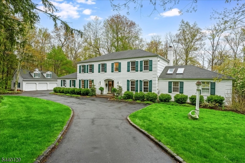 Set on a quiet cul-de-sac in the coveted Washington Valley section of Morris Township, this beautiful residence offers the perfect balance of privacy, scale and proximity to downtown Morristown. This home is designed for both refined everyday living and effortless entertaining. The expansive lower level features generous gathering spaces, a true chef's kitchen, and serene retreats with picturesque views-along with a convenient first floor bedroom suite ideal for guest or extended living. Throughout the home, custom built-ins, detailed millwork and carefully curated finishes create a timeless, elevated aesthetic. Upstairs the primary suite is a private sanctuary, highlighted by a luxurious bath, oversized walk-in closets, and a beautifully designed dressing area with custom storage. Additional bedrooms are well proportioned and share a tastefully designed bath. A rare offering, the three bay detached garage is complemented by a versatile loft space above-complete with a full bath, abundant storage, and a large workshop creative, recreational, or guest use. The grounds evoke a true estate setting with sweeping lawns, outdoor pool with hot tub and wooded acreage offering a "vacation at home" lifestyle year-round. An exceptional opportunity to own a private retreat just minutes from Morristowns vibrant downtown, dining, and transportation.