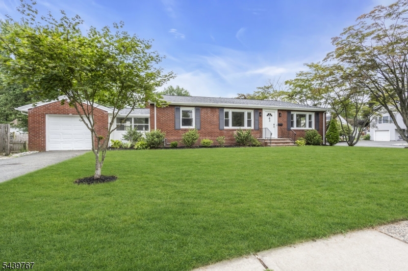 Welcome Home to this Updated and Charming 1st Floor Rental Opportunity! This custom brick home has only 2 rental units set in a lovely residential neighborhood in New Providence. Unit A is the larger unit with Open Floor Plan Living Room/Dining Room to Eat in Kitchen. Filled with natural sunlight and gleaming wood floors. Two spacious bedrooms share 1 stylish white bathroom. BONUS: 3 Season Breezeway easily serves as a Home Office, Mud Room or Play Room. Huge, finished Finished Basement is shared and offers 2 sets of Washers/Dryers, and plenty of storage space. The yard and patio is perfect for fun and games--yard care done by owner--so tenant simply enjoys! Vibrant Downtown, Top Ranked Schools, and Trains into NYC Penn Station are all near-by!