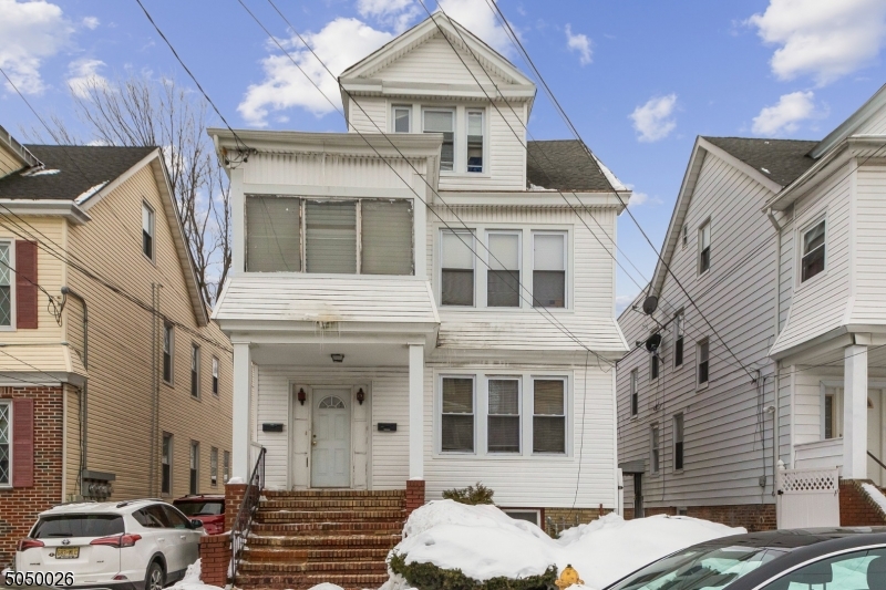 Incredible Investment Opportunity! This proven money maker includes two units, a detached garage, and so much more! The first unit opens to a huge living room and dining room with an eat-in kitchen. This unit include two large bedrooms and a bathroom! The second unit includes both the second and third floor of this home. The second floor mirrors the first unit, and the third floor includes another bedroom and an office/sunroom. Near public transportation, major highways, schools, shops, etc! Don't miss this one!