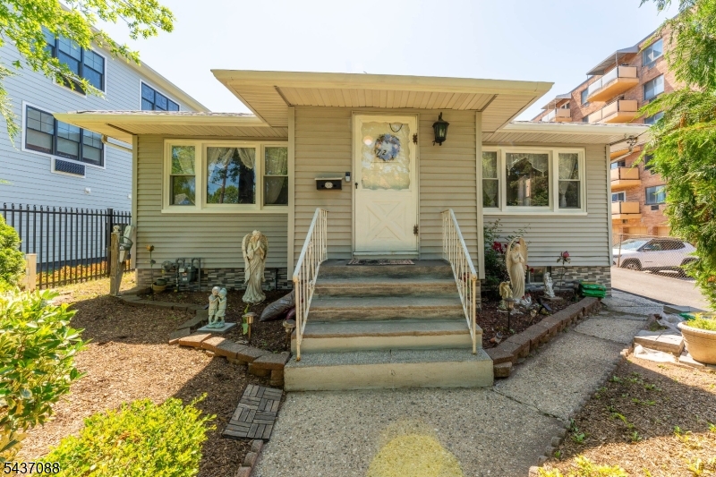 Welcome to this beautifully maintained home located in the highly sought-after Fairmount section of Hackensack. Situated on a quiet residential street, this property offers an unbeatable combination of space, location, and modern updates.The home features a brand-new roof installed just two months ago, providing peace of mind for years to come. Inside, you'll find spacious living areas and a fully finished basement offering incredible flexibility, complete with three additional rooms, a full bathroom, a large recreation area, and an entertainment space featuring a custom bar perfect for hosting guests, working from home, or accommodating extended living needs.The exterior is equally impressive, boasting a long driveway with parking for up to seven vehicles and two detached garages, a rare find in this area.Conveniently located near Fairleigh Dickinson University, major medical facilities, shopping, restaurants, parks, and public transportation, including nearby train access for an easy commute to New York City.Don't miss this opportunity to own a spacious home in one of Hackensack's most desirable neighborhoods. Highest & best due Friday 06/12/2026 at 5:00 pm